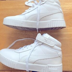 PUMA Carina hightop sneakers.